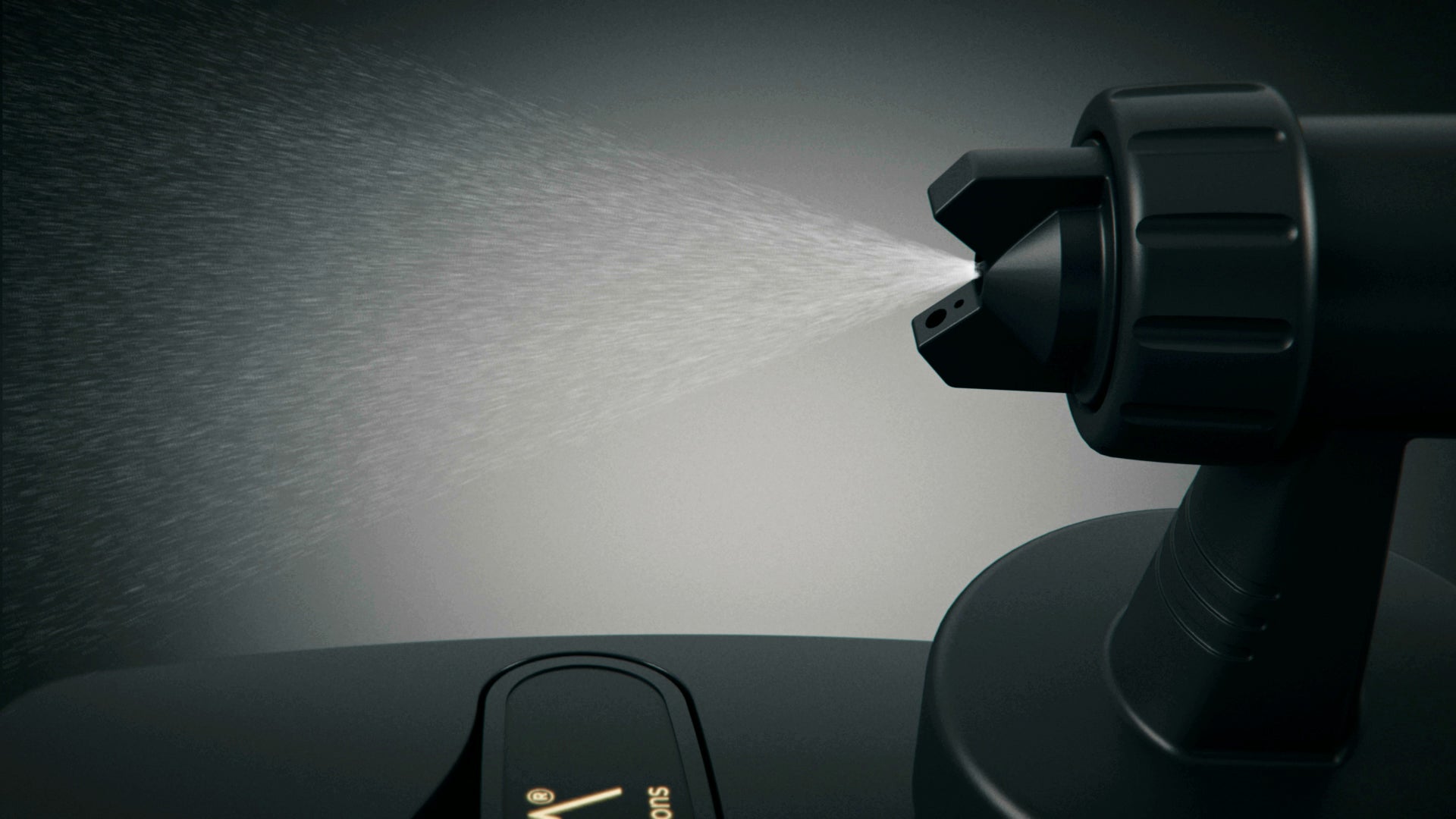 Image of spray tan coming through the nozzle