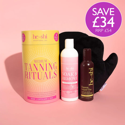 Image showing He-Shi Tanning Rituals Gift Set on a pink background and the products contained beside it