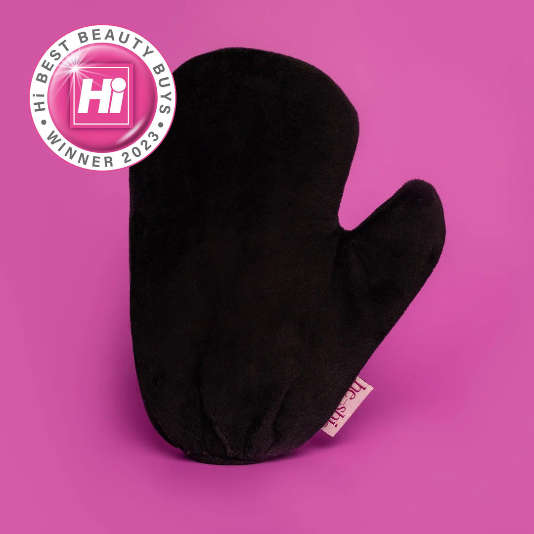 he-shi black velvet tanning mitt displayed on a pink background and featuring a hi best beauty buys of 2023 award icon in the top left corner